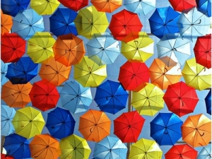 Colourful Portuguese Umbrella Canopies. Image by Patricia Almeida http://www.flickr.com/photos/vento-na-praia/